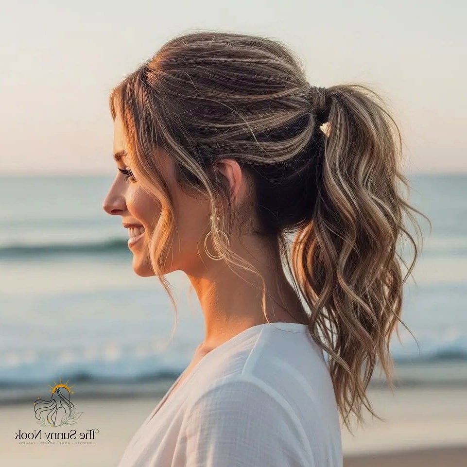 17 Gorgeous Short Ponytail Hairstyles Black Women for Every Hair Type 15 The Wavy Beach Pony