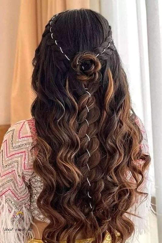 16 Open Hairstyles For Lehenga for When You Need a Fresh Change 12 Wavy Hair With a Floral Braid Accent