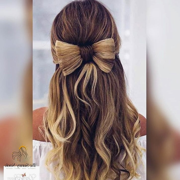 25 Cute Hairstyles With A Bow Everyone Is Pinning Right Now 18 Wavy Half-Up With A Velvet Bow