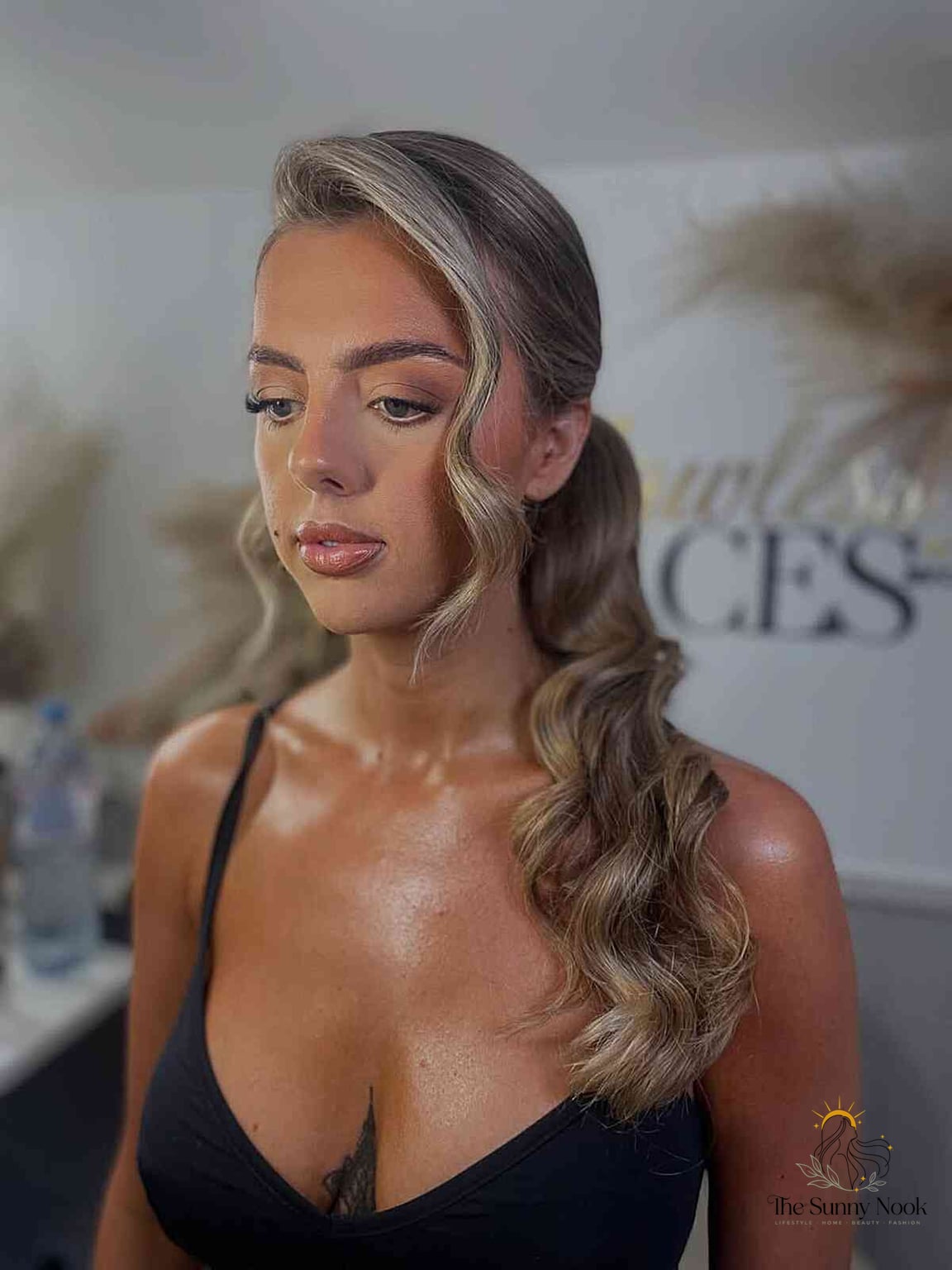 22 Side Ponytail Hairstyles to Transform Your Look Instantly 8 Wavy Side Ponytail With Loose Waves